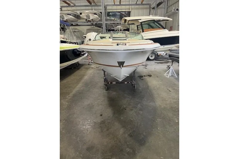 Slide: The Image of 2011 Chris-Craft Launch 22 boat in storage, front view. - 6