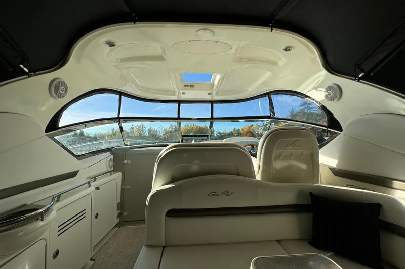 Slide: The Image of Interior of 2006 Sea Ray 38 Sundancer yacht with panoramic windows and seating. - 10