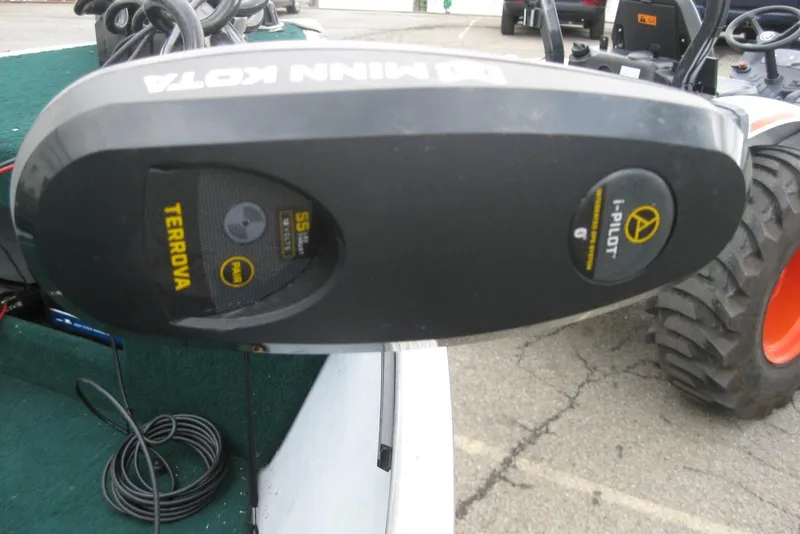 Slide: The Image of Minn Kota Terrova trolling motor on 1999 Lund 1440-V Rebel Tiller boat. - 12