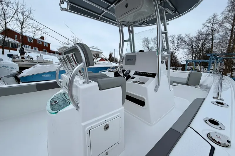 Slide: The Image of 2026 Cape Horn 22 OS boat interior with modern console and seating. - 10