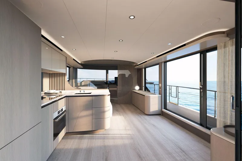 Slide: The Image of Luxurious interior of 2026 Absolute 58 Navetta yacht with modern kitchen and ocean view. - 13
