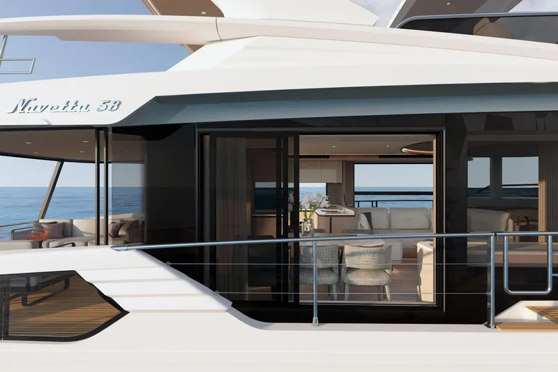 Slide: The Image of Luxurious Absolute 58 Navetta yacht interior, 2026 model, with elegant seating and ocean view. - 4