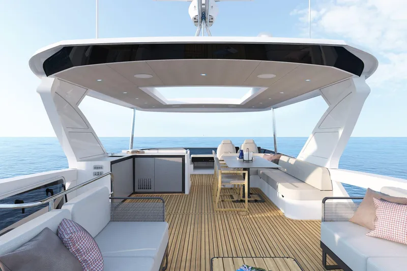 Slide: The Image of Luxurious 2026 Absolute 58 Navetta yacht deck with modern seating and ocean view. - 8