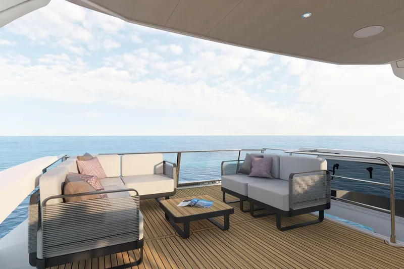 Slide: The Image of Luxurious deck of 2026 Absolute 58 Navetta yacht with modern seating and ocean view. - 9