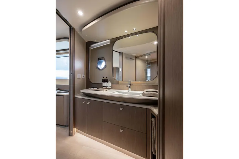 Slide: The Image of Luxurious bathroom interior of 2026 Absolute Navetta 58 yacht, featuring modern fixtures and elegant design. - 42