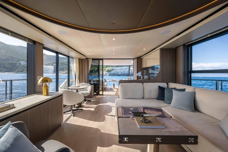 Slide: The Image of Luxurious interior of 2026 Absolute Navetta 58 yacht with panoramic ocean views. - 33