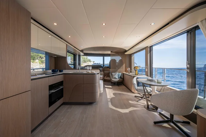 Slide: The Image of Luxurious interior of 2026 Absolute Navetta 58 yacht with ocean view and modern furnishings. - 29
