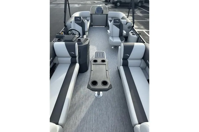Slide: The Image of 2026 Bennington S 22 SSR pontoon boat interior with spacious seating and cup holders. - 5