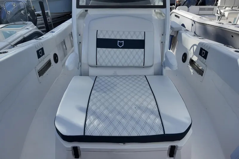 Slide: The Image of 2026 Sea Fox 268 Commander boat interior with cushioned seating and modern design. - 11