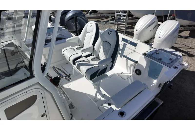 Slide: The Image of 2026 Sea Fox 268 Commander boat interior with dual seats and Yamaha engines. - 13