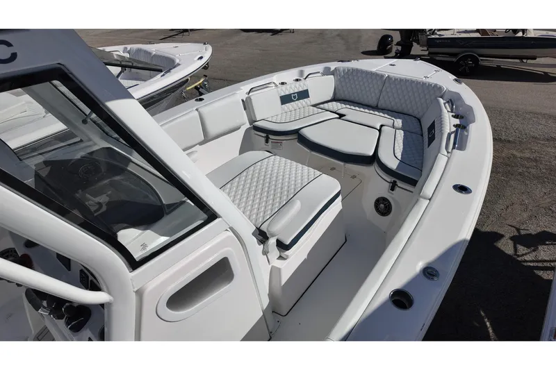 Slide: The Image of 2026 Sea Fox 268 Commander boat interior with cushioned seating and modern design. - 6