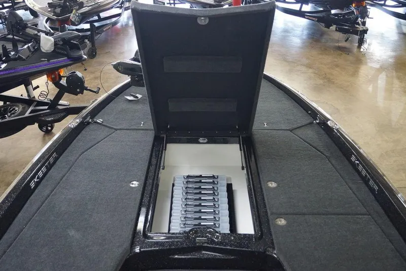 Slide: The Image of 2020 Skeeter ZXE20 boat with open storage compartment, showcasing organized interior. - 15