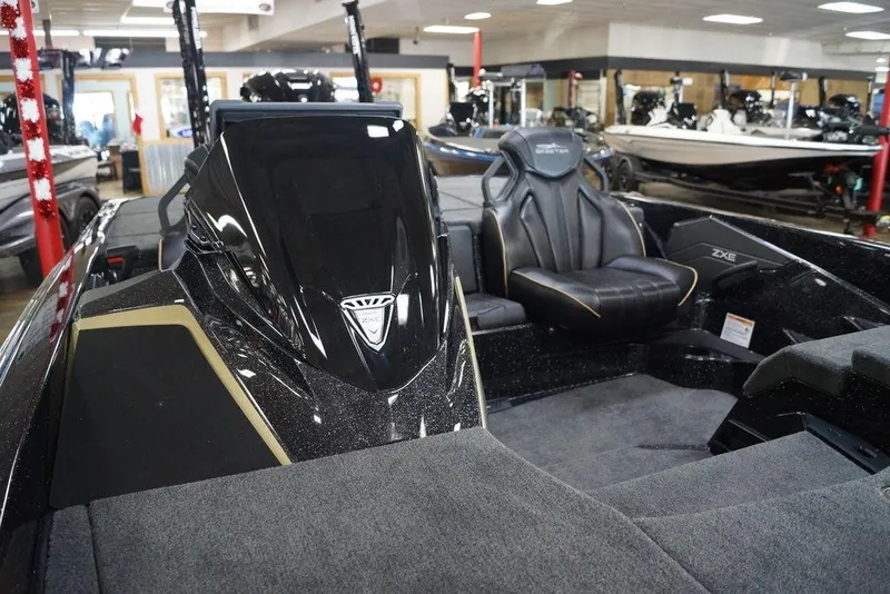 Slide: The Image of 2020 Skeeter ZXE20 boat interior with sleek black design and comfortable seating. - 18