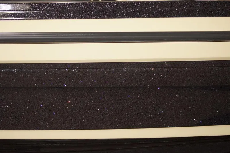 Slide: The Image of 2020 Skeeter ZXE20 boat with sparkling black and cream exterior detailing. - 29