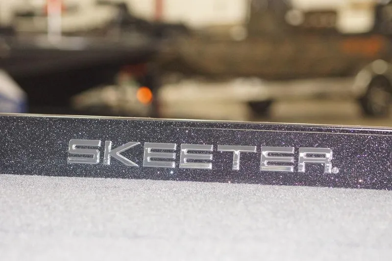 Slide: The Image of Skeeter ZXE20 2020 model logo on a glittery surface. - 34