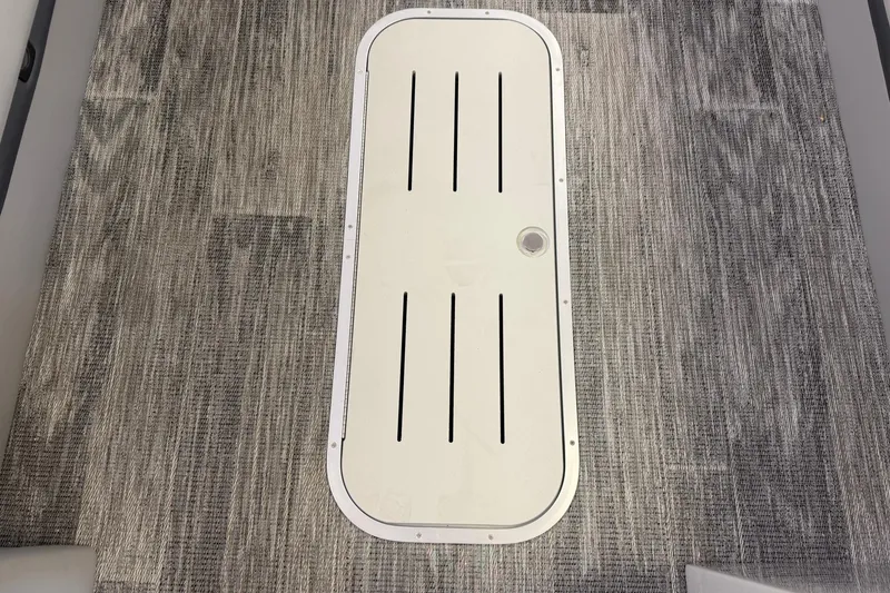 Slide: The Image of Flooring of 2026 Bentley Pontoons Elite 253 Swingback with hatch detail. - 11