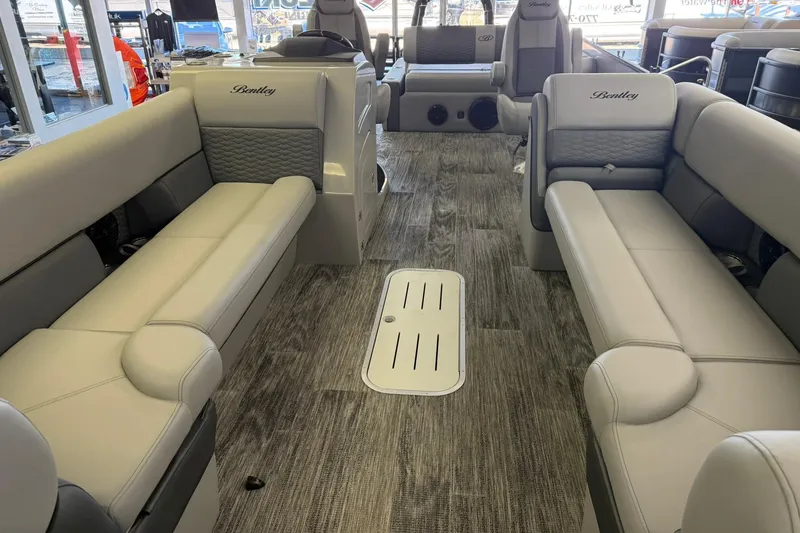 Slide: The Image of 2026 Bentley Pontoons Elite 253 Swingback interior with luxurious seating and modern design. - 3