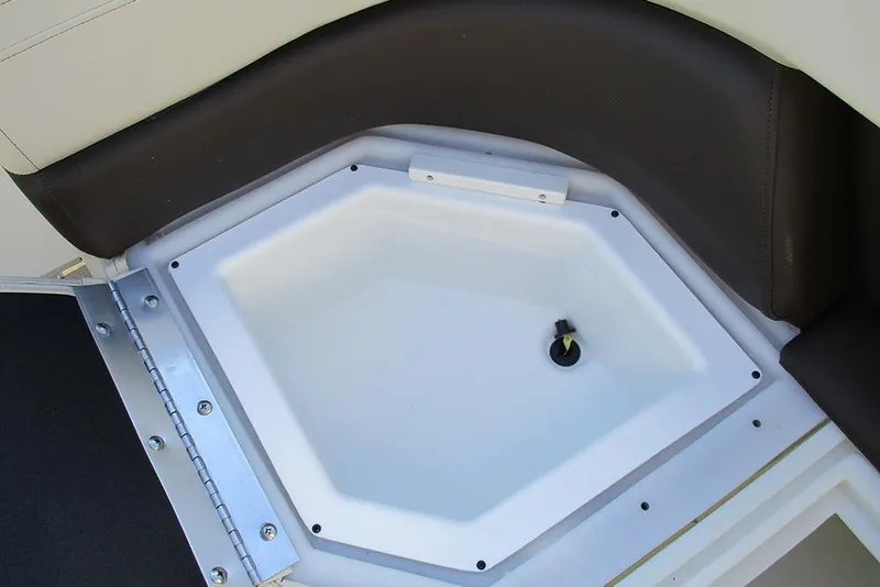 Slide: The Image of Built-in cooler compartment on 2026 SunCatcher Fusion 324RC boat. - 13