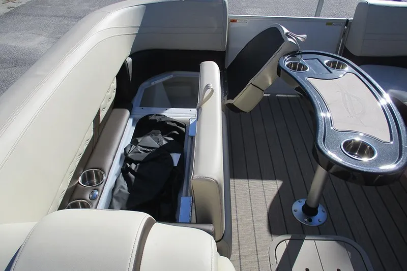 Slide: The Image of Luxurious interior of 2026 SunCatcher Fusion 324RC boat with seating and table. - 15