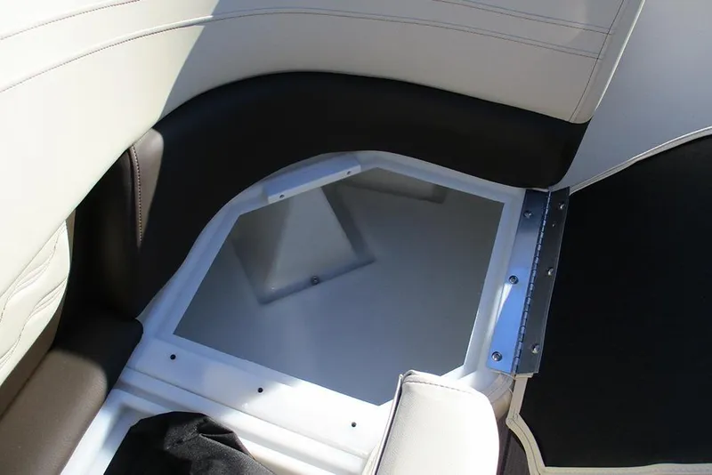Slide: The Image of Interior seating of 2026 SunCatcher Fusion 324RC boat, featuring sleek design and storage compartment. - 17