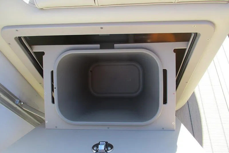 Slide: The Image of 2026 SunCatcher Fusion 324RC storage compartment, open view, showcasing interior space. - 20