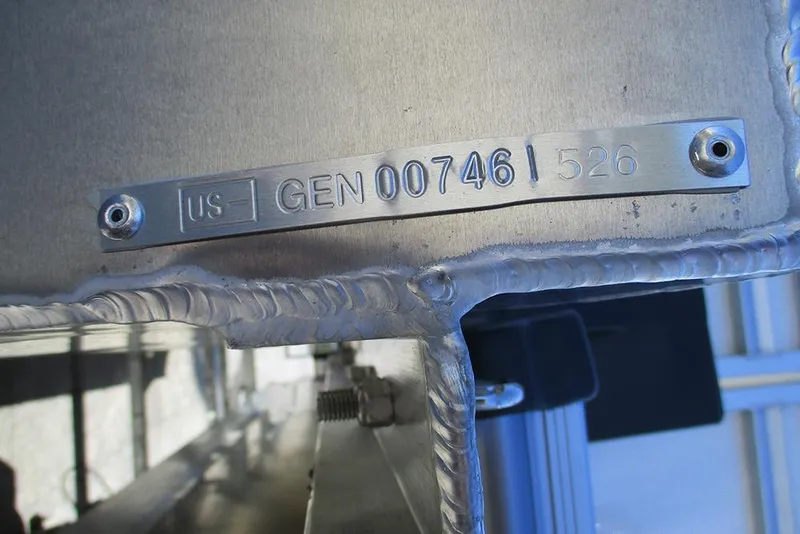 Slide: The Image of Metallic serial number plate on SunCatcher Fusion 324RC, year 2026, with welded edges. - 37