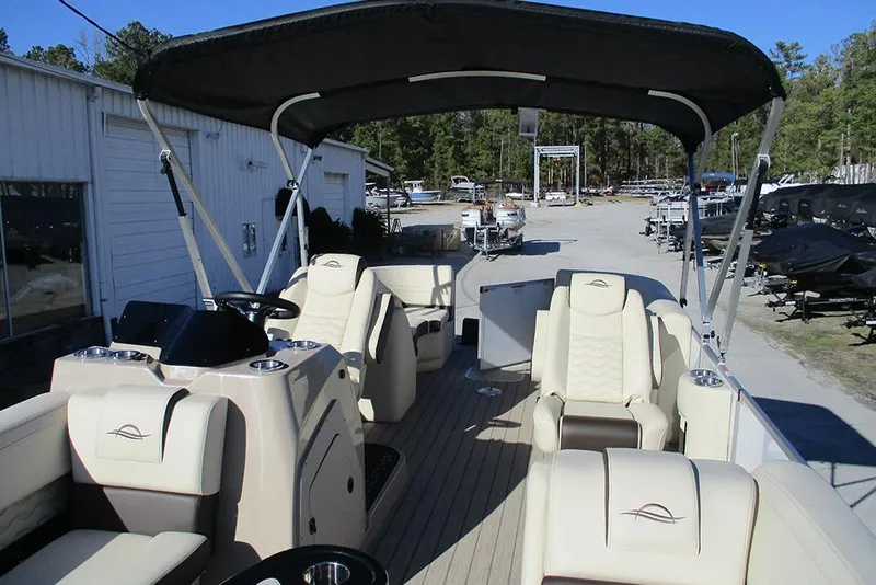 Slide: The Image of Luxury SunCatcher Fusion 324RC pontoon boat, 2026 model, with spacious seating and canopy. - 9