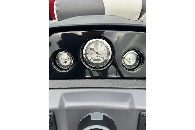 Slide: The Image of Dashboard of 2026 Bennington 20 S Quad Bench with gauges and controls. - 16