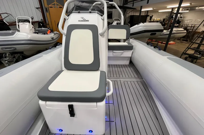 Slide: The Image of 2026 Highfield Classic 420 boat interior with seating and modern design. - 9