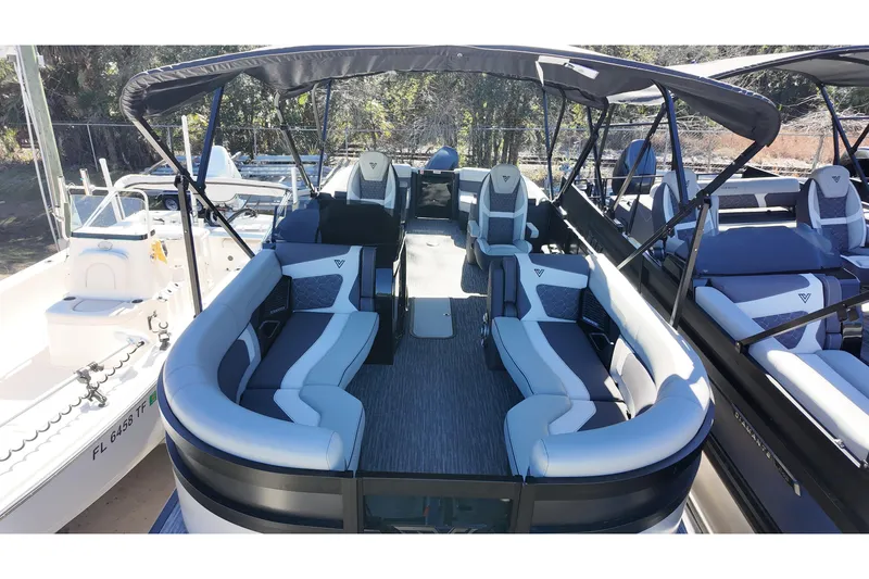 Slide: The Image of 2026 Viaggio Diamante D22U pontoon boat with spacious seating and canopy. - 13