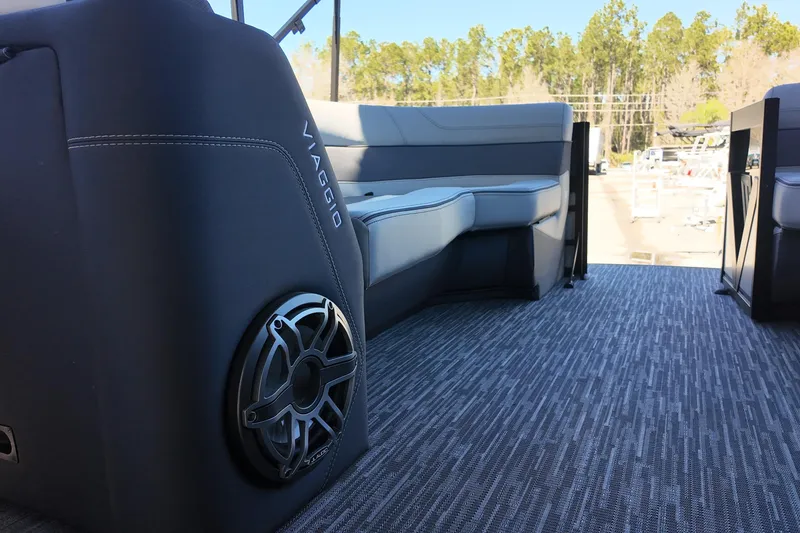 Slide: The Image of Interior of 2026 Viaggio Diamante D22U boat with stylish seating and speaker system. - 9