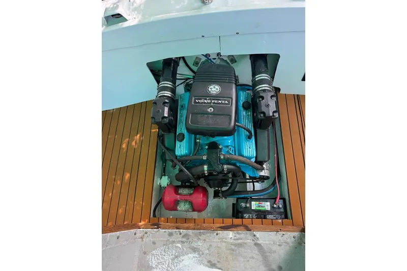Slide: The Image of 1967 Formula 233 boat engine with Volvo Penta, on wooden deck. - 9