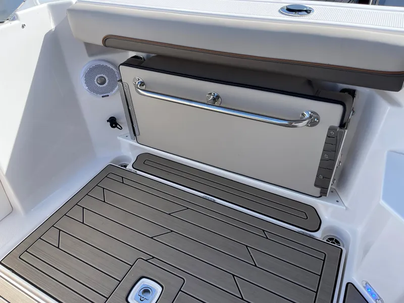 Slide: The Image of 2023 Cutwater C-288 boat interior with storage compartment and speaker. - 17