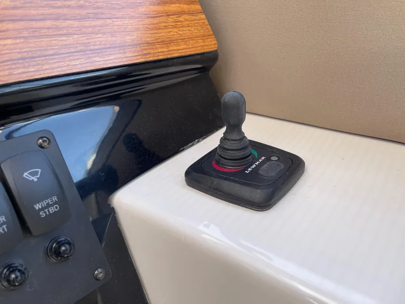 Slide: The Image of Joystick control on 2023 Cutwater C-288 boat dashboard. - 35