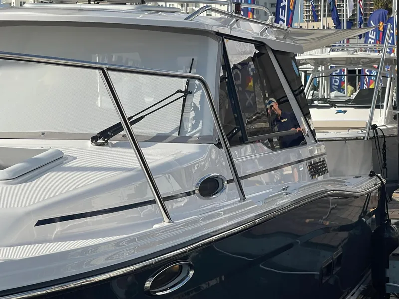 Slide: The Image of 2023 Cutwater C-288 boat at a marina, side view. - 5