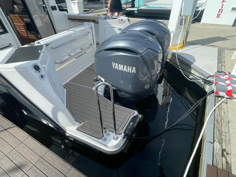 Slide: The Image of 2023 Cutwater C-288 boat with twin Yamaha outboard engines docked. - 9