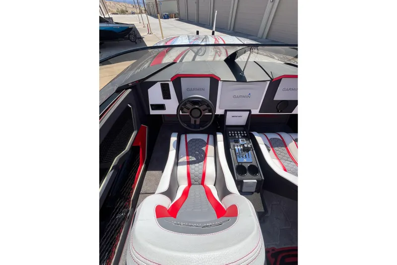 Slide: The Image of Interior of 2009 Skater 388 boat with Garmin navigation and stylish seating. - 19