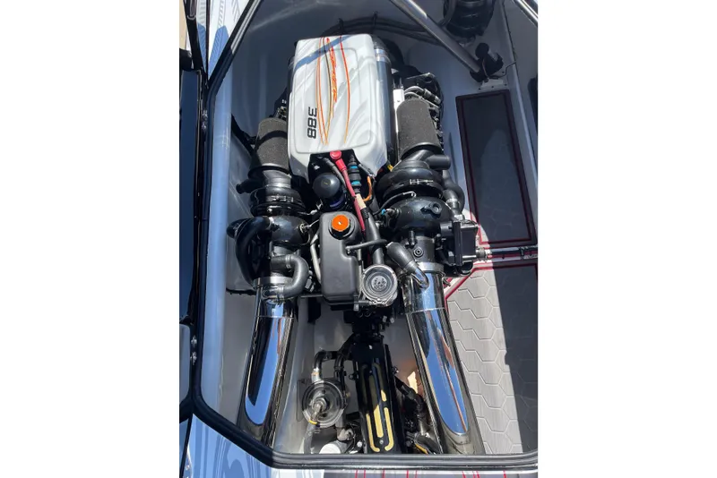 Slide: The Image of High-performance engine of 2009 Skater 388 boat, showcasing sleek design and advanced mechanics. - 23