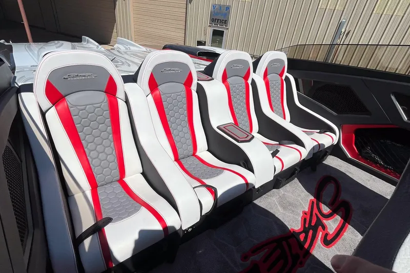 Slide: The Image of Luxurious Skater 388 boat interior with stylish red and gray seating, 2009 model. - 9