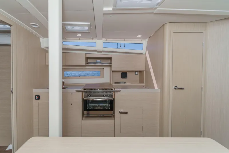 Slide: The Image of Modern interior of 2025 Beneteau Oceanis 37.1 yacht with sleek kitchen design. - 10