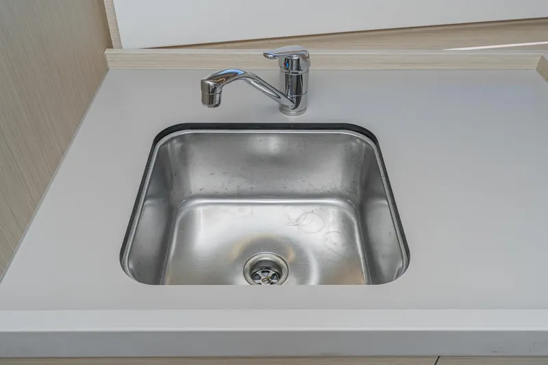 Slide: The Image of Stainless steel sink in 2025 Beneteau Oceanis 37.1 yacht interior. - 17