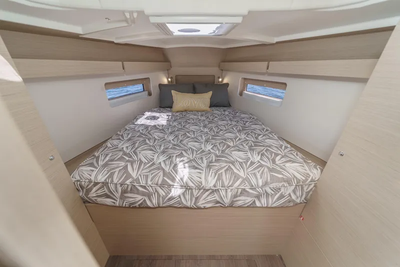 Slide: The Image of Luxurious cabin interior of 2025 Beneteau Oceanis 37.1 yacht with cozy bedding. - 18