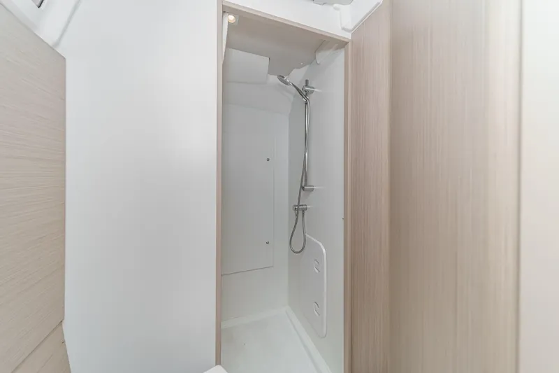 Slide: The Image of Shower area in 2025 Beneteau Oceanis 37.1 yacht, featuring modern design and fixtures. - 23