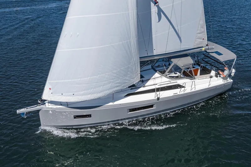 Slide: The Image of 2025 Beneteau Oceanis 37.1 sailing yacht on open water, side view. - 31