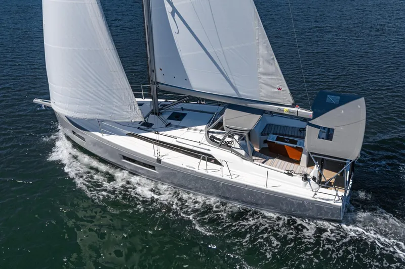 Slide: The Image of 2025 Beneteau Oceanis 37.1 sailing on open water, showcasing sleek design and modern features. - 35