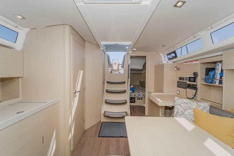 Slide: The Image of 2025 Beneteau Oceanis 37.1 yacht interior with modern design and light wood finish. - 4