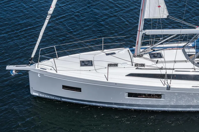 Slide: The Image of 2025 Beneteau Oceanis 37.1 sailboat on water, showcasing sleek design and modern features. - 52