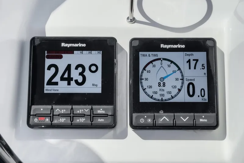 Slide: The Image of Raymarine navigation displays on 2025 Beneteau Oceanis 37.1, showing wind direction and depth. - 65