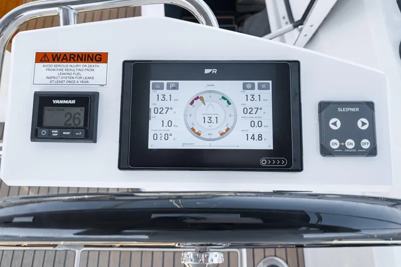 Slide: The Image of Control panel of 2025 Beneteau Oceanis 37.1 sailboat with navigation instruments. - 69