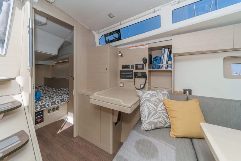 Slide: The Image of Interior of 2025 Beneteau Oceanis 37.1 yacht, featuring modern design and cozy seating area. - 7